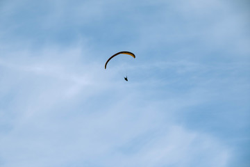 paragliding in the blue sky