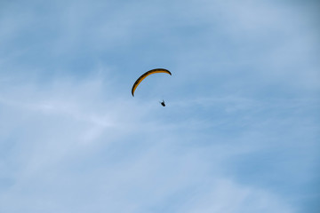 paragliding in the blue sky