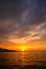 Obraz premium beautiful sunset over the Ionian Sea near the coast of Greece