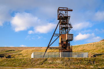 Fototapeta na wymiar Grove Rake Lead Mine Headgear, the remains of the mine are near Rookhope in Weardale, County Durham, the last remaining headgear in the North Pennines orefield