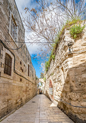 Morning in a narrow medieval street of old Jerusalem city, Israel