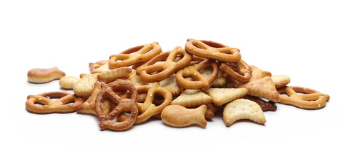 Salty cracker and pretzel snacks, party mix isolated on white background