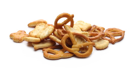 Salty cracker and pretzel snacks, party mix isolated on white background