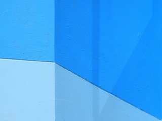 old blue wall with shadow texture