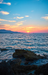 Fototapeta premium View of the sunset over Greece from Albania. The Ionian Sea.
