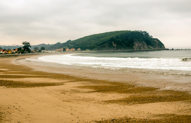 Sand beach in Asturias in the north of Spain in a sunny day