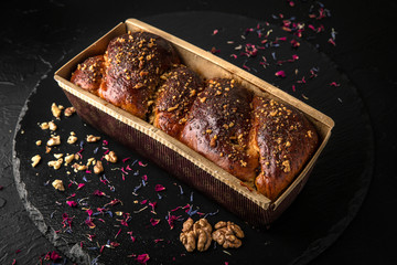 Easter cake with raisins, nuts, poppy seeds, chocolate. Holiday pastries.