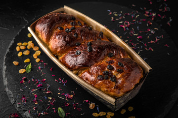 Easter cake with raisins, nuts, poppy seeds, chocolate. Holiday pastries.