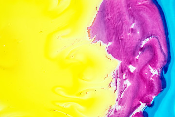 Background of pink, yellow, blue ink waves
