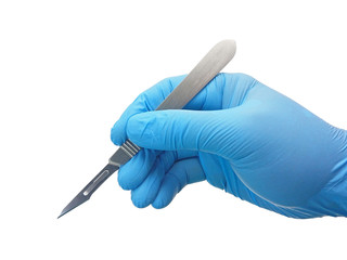 Hand of surgeon in blue medical glove holding a scalpel with blade isolated on white background with clipping path