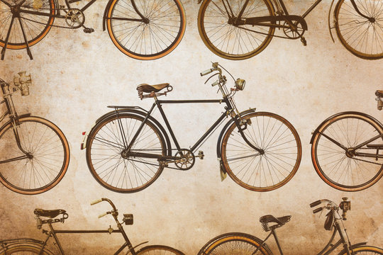 Different vintage rusted bicycles isolated on white