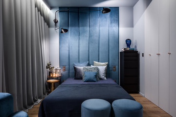 Dark bedroom with double bed