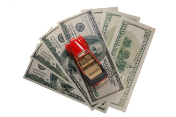 classic small decorative of model red toy car is on the banknote. 