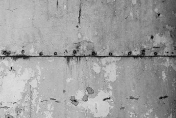 The concrete texture, wall, with cracks and scratches can be used as a  background, web banner with space for text