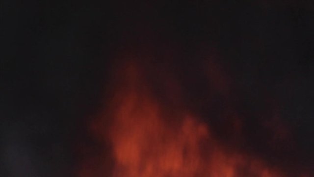Burning Fire Flame With Smoke. House Engulfed in Flames Showing Fire Smoke.