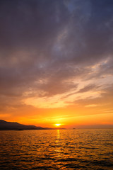 View of the sunset over Greece from Albania. The Ionian Sea.