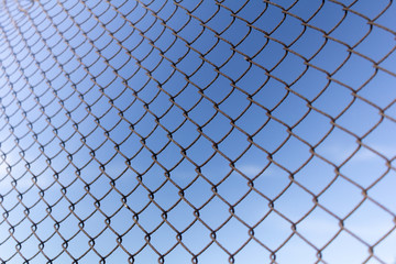 Fototapeta premium Protective mesh on a blue background