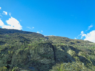 Fototapeta na wymiar view to a small village in the swiss alps