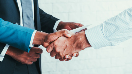 Successful partnership and cooperation. Professional business relations. Shaking hands after...