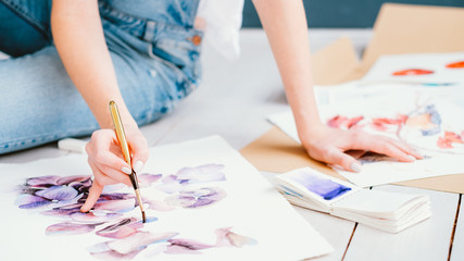 Inspiration and art talent. Painting hobby. Woman painting beautiful floral artwork. Creative design. © golubovy