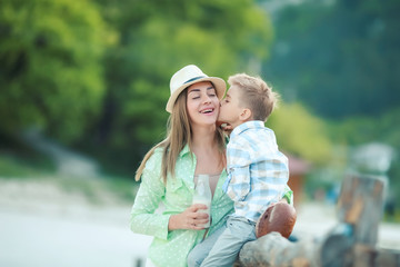 Mother and son holding hand in hand