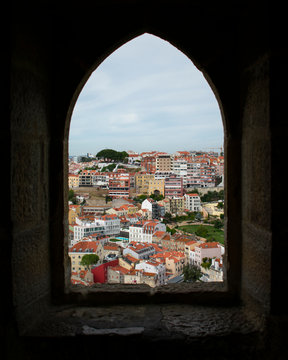 View of Alfama through a window.