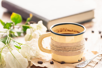 Metal enameled mug or cup of fresh coffee