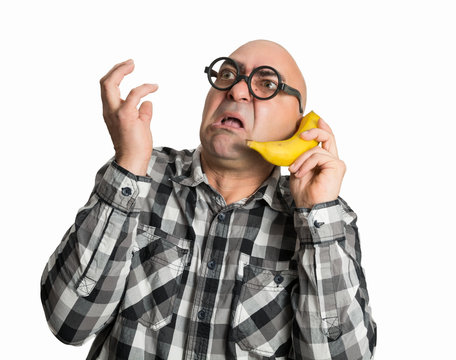Hablando por tel&eacute;fono con una banana