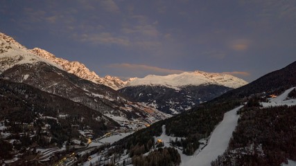 View of valley near Bormio (Italian Alps) at sunset