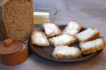 Small sandwiches on homemade bread with butter