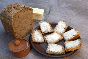 Small sandwiches on homemade bread with butter