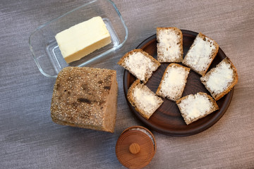 Small sandwiches on homemade bread with butter