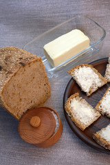 Small sandwiches on homemade bread with butter