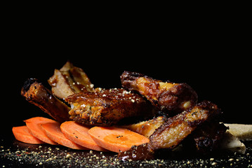 chicken and Ribs on grill