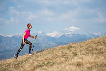 Young athlete running in the mountains and skyrunning during a workout