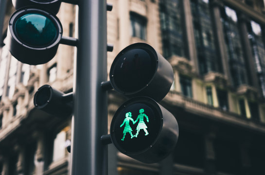 Traffic lights of a city with lesbian figures