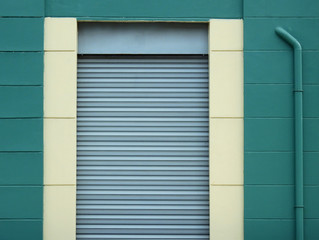 wall with metal door