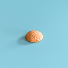 Half walnut shell on blue background