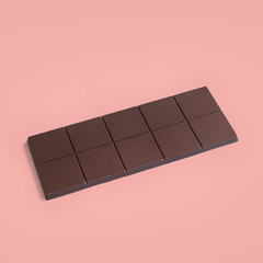 Chocolate bar on a pink background
