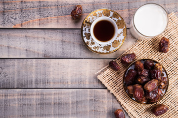 Milk and dates fruit. Muslim simple Iftar concept. Ramadan food and drinks.