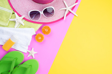 Beach accessories retro film camera, picture frame, sunglasses, starfish, beach hat and sea shell...