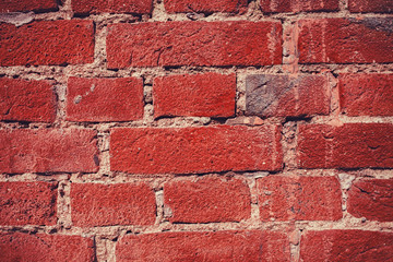 Old grunge red brick wall background 