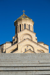 Obraz premium Tsminda Sameba or The Holy Trinity Cathedral of Tbilisi, Georgia in clear weather, bottom view