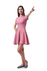 Naklejka premium Full length woman in pink dress pointing to the side