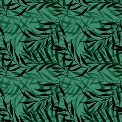 Abstract tropical leaves of dark green color over a light green color