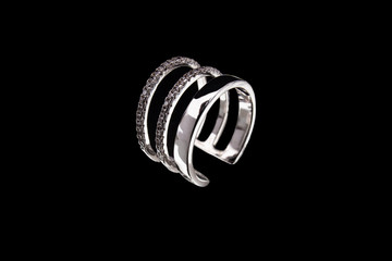 White gold ring on a black background