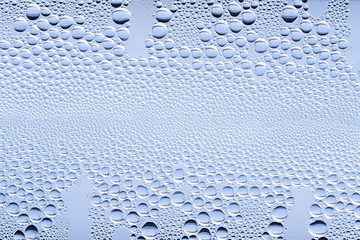 Water drops on window glass, texture