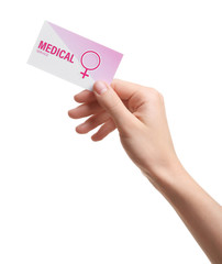 Girl holding medical business card isolated on white, closeup. Women's health service