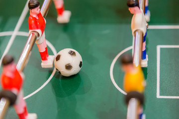 Fototapeta premium mini football table for play and fun for children. football game for boys and girls, fun at home.