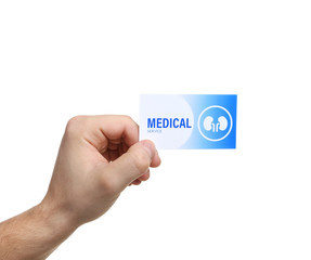 Man holding medical business card isolated on white, closeup. Nephrology service